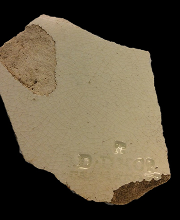 Creamware flat vessel, probably plate, with impressed mark “D D & Co.”.  David Dunderdale & Company, 1790-1821.